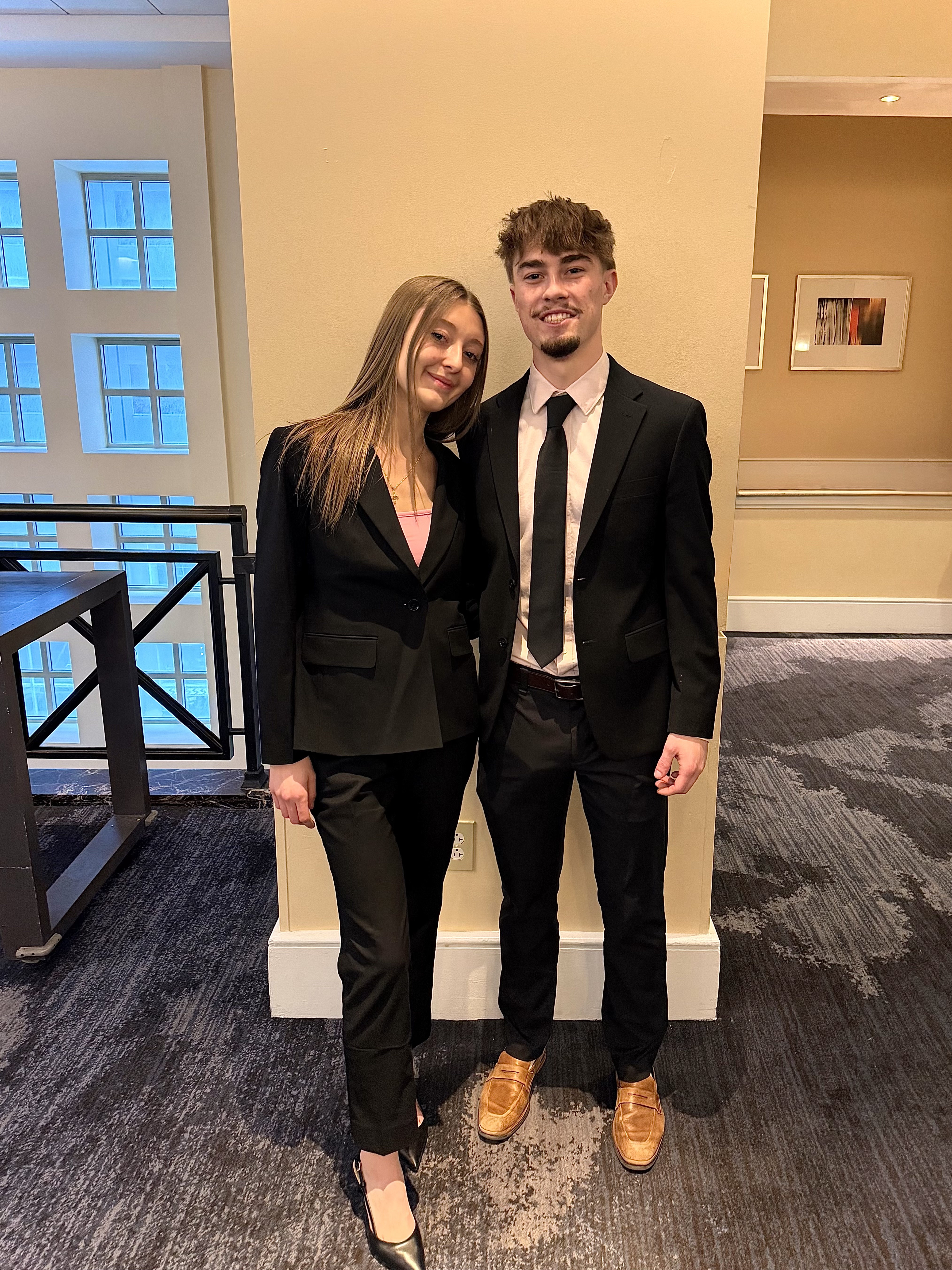 Accurate Marketing representatives at a professional event